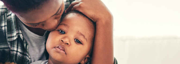 Shot of a mother cradling her little baby boy
