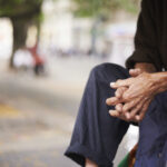 close up of clasped hands